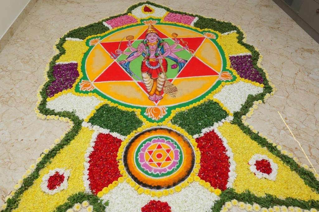 Auspicious Shudarshana Chakra floral rangoli art representing Lord Sudarshana
